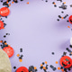 Halloween purple frame background flatlay with pumpkins and party decor Halloween purple frame background flatlay with pumpkins and party decor - PhotoDune Item for Sale