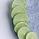 Slices of lime on a plate Slices of lime on a plate - PhotoDune Item for Sale