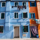 Colorful houses and laundry in Burano island, Italy Colorful houses and laundry in Burano island, Italy - PhotoDune Item for Sale