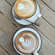 Two cups of coffee latte and mocha on a wooden table Two cups of coffee latte and mocha on a wooden table - PhotoDune Item for Sale