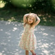 Little girl 3 years old in a summer sundress in the park. Summer time. Little girl 3 years old in a summer sundress in the park. Summer time. - PhotoDune Item for Sale