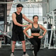 A professional Asian male fitness coach is training a female client in a gym, checking her form. A professional Asian male fitness coach is training a female client in a gym, checking her form. - PhotoDune Item for Sale