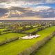Aerial View of Sunlit Polder Landscape at Sunset, Friesland, Netherlands Aerial View of Sunlit Polder Landscape at Sunset, Friesland, Netherlands - PhotoDune Item for Sale