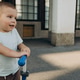 child on a scooter in the city street child on a scooter in the city street - PhotoDune Item for Sale