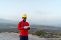 African engineer working with tablet on construction site - Technology and industry concept African engineer working with tablet on construction site - Technology and industry concept - PhotoDune Item for Sale