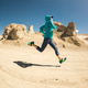 Fitness woman trail runner cross country running on sand desert Fitness woman trail runner cross country running on sand desert - PhotoDune Item for Sale