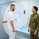 Radiographer showing military patient magnetic resonance imaging ...