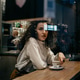 A Curly hair young woman Drinking Coffee. A Curly hair young woman Drinking Coffee. - PhotoDune Item for Sale