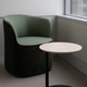 Modern green armchair minimalist round side table bright office corner Modern green armchair minimalist round side table bright office corner - PhotoDune Item for Sale