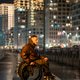 Lonely man with disability in wheelchair in rgb neon color light on late night walk outside. Lonely man with disability in wheelchair in rgb neon color light on late night walk outside. - PhotoDune Item for Sale