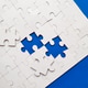 Incomplete White Jigsaw Puzzle with Missing Pieces Incomplete White Jigsaw Puzzle with Missing Pieces - PhotoDune Item for Sale