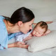 Pretty young mother holding her cute newborn baby in her arms.Healthy sleep Pretty young mother holding her cute newborn baby in her arms.Healthy sleep - PhotoDune Item for Sale