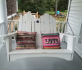Love to enjoy the outdoors on a swing with colorful pillows & one of them with the word LOVE Love to enjoy the outdoors on a swing with colorful pillows & one of them with the word LOVE - PhotoDune Item for Sale
