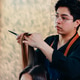 Young male hairdresser cutting client hair Young male hairdresser cutting client hair - PhotoDune Item for Sale