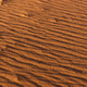 Sand dunes in desert at sunset showing patterns and textures of golden sand Sand dunes in desert at sunset showing patterns and textures of golden sand - PhotoDune Item for Sale