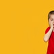 Child in red t-shirt on yellow background, boy 5 years old Child in red t-shirt on yellow background, boy 5 years old - PhotoDune Item for Sale