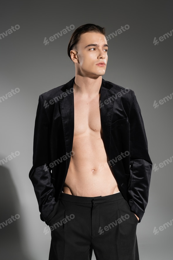 young, sexy and fashionable man wearing black silk blazer on shirtless muscular torso and looking Stock Photo by LightFieldStudios young, sexy and fashionable man wearing black silk blazer on shirtless muscular torso and looking Stock Photo by LightFieldStudios