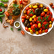 Fresh ripe cherry tomatoes and large red tomatoes, top view Fresh ripe cherry tomatoes and large red tomatoes, top view - PhotoDune Item for Sale