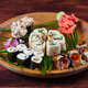 Sushi and rolls on wooden plate with spices and green leaves Sushi and rolls on wooden plate with spices and green leaves - PhotoDune Item for Sale