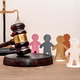 Judge's gavel, various human figures against a backdrop of the scales of justice Judge's gavel, various human figures against a backdrop of the scales of justice - PhotoDune Item for Sale