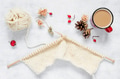 Knitting and Cup of Coffee on the White Table Knitting and Cup of Coffee on the White Table - PhotoDune Item for Sale