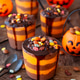 Colorful layered dessert for Halloween Colorful layered dessert for Halloween - PhotoDune Item for Sale