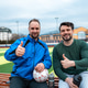 Two men giving thumbs up on a sports field after soccer practice in the afternoon Two men giving thumbs up on a sports field after soccer practice in the afternoon - PhotoDune Item for Sale