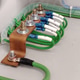 Image of a copper tape being used as a ground or earth terminal with multiple green wires connected. Image of a copper tape being used as a ground or earth terminal with multiple green wires connected. - PhotoDune Item for Sale