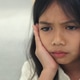 Beautiful young girl kid touching her mouth with her hand with a painful expression Beautiful young girl kid touching her mouth with her hand with a painful expression - PhotoDune Item for Sale