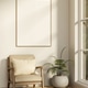 White frame on wall over wooden armchair and potted plant on parquet floor with sunlight from window White frame on wall over wooden armchair and potted plant on parquet floor with sunlight from window - PhotoDune Item for Sale