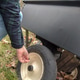Person fixing a cart wherl Person fixing a cart wherl - PhotoDune Item for Sale
