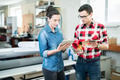 Printing experts discussing design and paper Printing experts discussing design and paper - PhotoDune Item for Sale