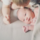 Siblings bonding. A boy and his little new born brother. Siblings bonding. A boy and his little new born brother. - PhotoDune Item for Sale