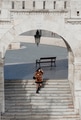 Stylish young woman standing on steps of Fisherman's bastion in Budapest, Hunagry Stylish young woman standing on steps of Fisherman's bastion in Budapest, Hunagry - PhotoDune Item for Sale