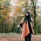 Young Woman wrapped in warm Shawl Poncho enjoying autumn walk in forest Young Woman wrapped in warm Shawl Poncho enjoying autumn walk in forest - PhotoDune Item for Sale