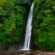 Munduk waterfall surrounded by lush jungle, Bali, Indonesia Munduk waterfall surrounded by lush jungle, Bali, Indonesia - PhotoDune Item for Sale