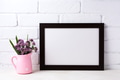 Black brown landscape frame mockup with purple flowers in pink Black brown landscape frame mockup with purple flowers in pink - PhotoDune Item for Sale