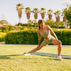 An Outdoor Fitness Routine Engaging in Stretching Exercises Under the Warm Sunshine An Outdoor Fitness Routine Engaging in Stretching Exercises Under the Warm Sunshine - PhotoDune Item for Sale