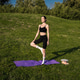 Graceful yoga practice in a serene green park on a sunny day Graceful yoga practice in a serene green park on a sunny day - PhotoDune Item for Sale