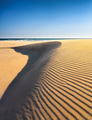 Sand dunes in the desert. Landscape in the daytime. Lines in the sand. Dunes and sky. Sand dunes in the desert. Landscape in the daytime. Lines in the sand. Dunes and sky. - PhotoDune Item for Sale