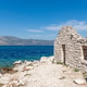 Abandoned old stone house on rocky coast at Vrnik island near Korcula, Croatia Abandoned old stone house on rocky coast at Vrnik island near Korcula, Croatia - PhotoDune Item for Sale