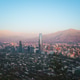 Panoramic view of Santiago de Chile skyline. Costanera Center skyscraper. Andes on the background Panoramic view of Santiago de Chile skyline. Costanera Center skyscraper. Andes on the background - PhotoDune Item for Sale