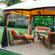 Outdoor covered gazebo with lighting and striking patio furniture; features stone fountain. Outdoor covered gazebo with lighting and striking patio furniture; features stone fountain. - PhotoDune Item for Sale