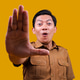Indonesian Male Civil Servant Showing Stop Gesture with Open Palm Indonesian Male Civil Servant Showing Stop Gesture with Open Palm - PhotoDune Item for Sale