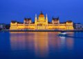 Parliament building in Budapest, Hungary. Parliament and reflections in the Danube River. Parliament building in Budapest, Hungary. Parliament and reflections in the Danube River. - PhotoDune Item for Sale