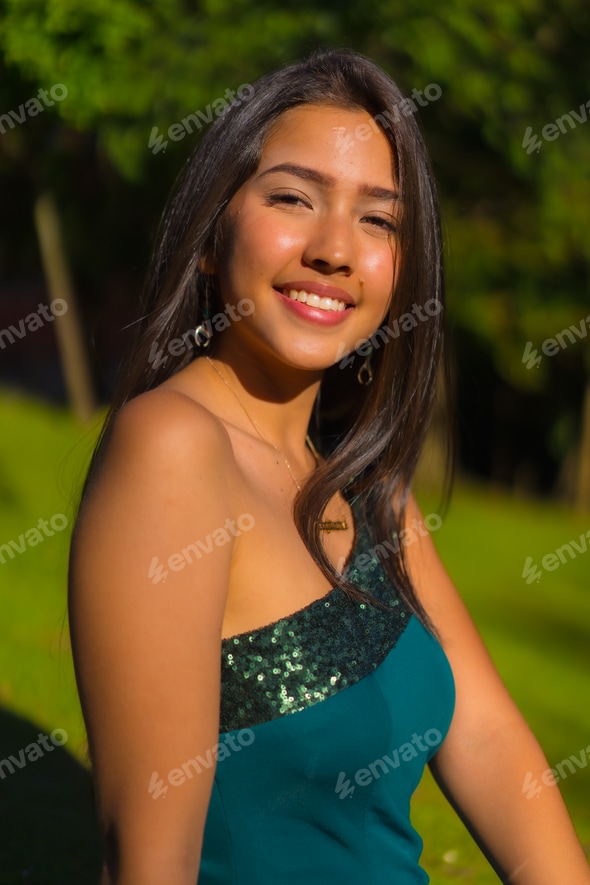 A pretty young brunette Latina with long straight hair, wearing a tight green dress Stock Photo by Unai82 A pretty young brunette Latina with long straight hair, wearing a tight green dress Stock Photo by Unai82