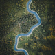 Top down aerial view of a winding blue river stream Top down aerial view of a winding blue river stream - PhotoDune Item for Sale