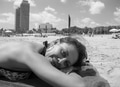 Black and White portrait of happy Latino woman relaxed while sunbathing at a Barcelona Spain Beach Black and White portrait of happy Latino woman relaxed while sunbathing at a Barcelona Spain Beach - PhotoDune Item for Sale