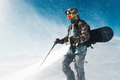 sportsman go with snowboard equipment in the snowstorm sportsman go with snowboard equipment in the snowstorm - PhotoDune Item for Sale