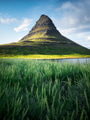 Kirkjufell. Mountains in the Iceland. High rocks and grass at the day time. Natural landscape at the Kirkjufell. Mountains in the Iceland. High rocks and grass at the day time. Natural landscape at the - PhotoDune Item for Sale